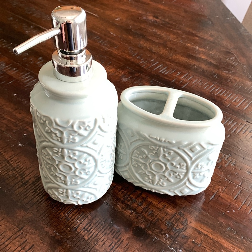Sonoma brand. Aqua colored soap dispenser & toothbrush holder.